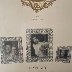 Three piece crystal frame set the phone.